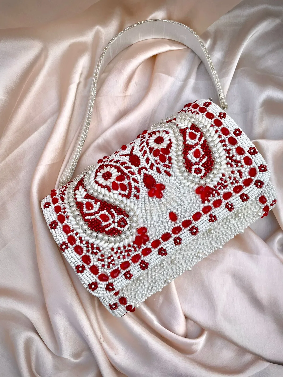 Bengali inspired handwork clutch